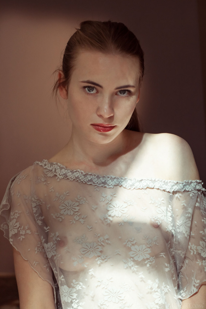 Gorgeous brunette Alaine wears a cute thigh-skimming playsuit for her MetArt debut 01